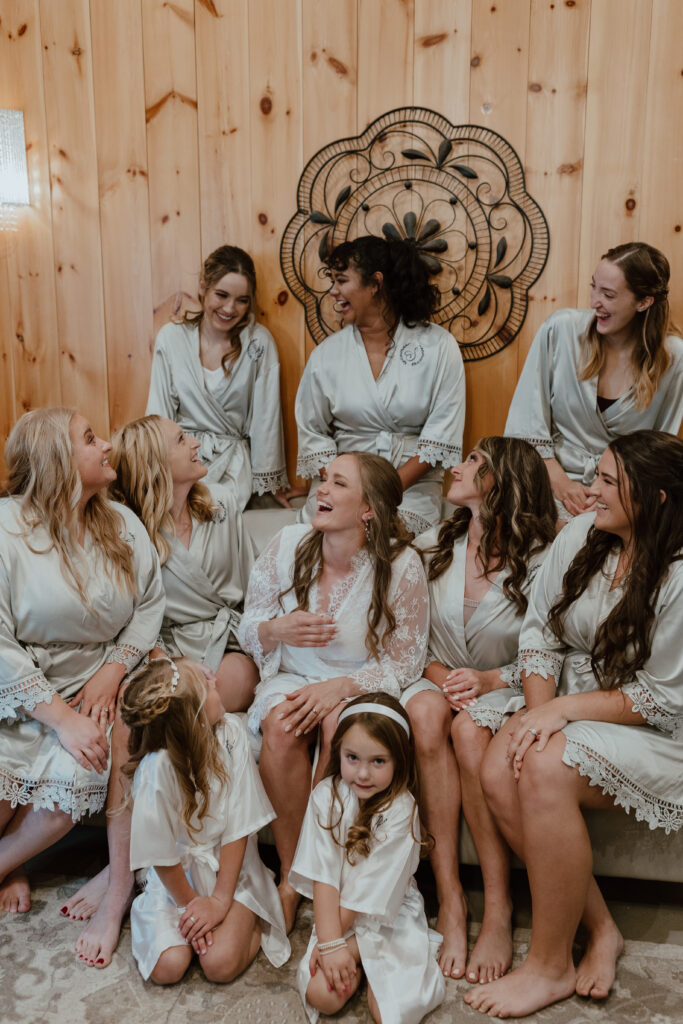 bridesmaids laughing during getting ready for wedding day